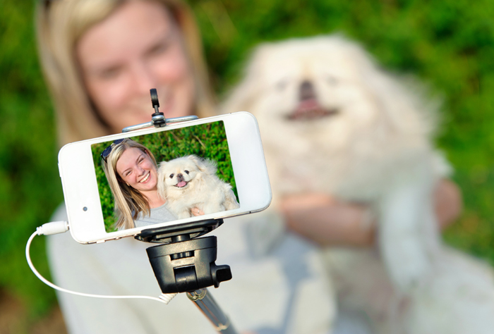 Beautiful girl with dog taken pictures of her self, instagram